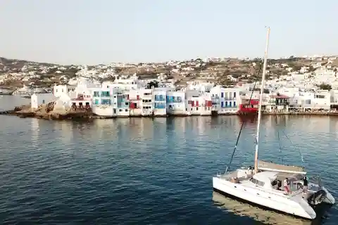 Mykonos Catamaran Delos Rhenia semi private cruise