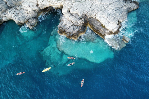 Pula: Cueva Puesta de Sol/ Tour nocturno en Kayak Transparente