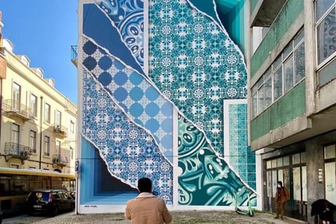 Lisbon: Street Art Walk with a local Artist Igor AKA Mr.Red