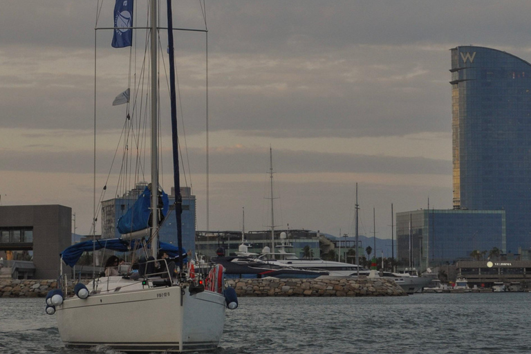 Barcelona: 2H Sailing with Open Bar, Snacks & Swim Stop