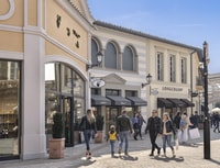 saída de Designer de Serravalle, Shuttle de Milão - Hizvo