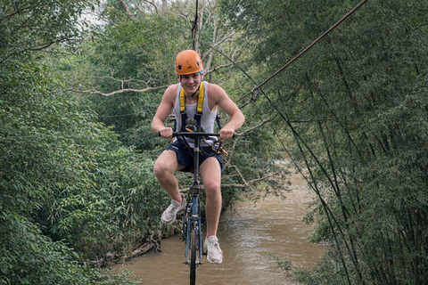 Chiang Mai: Jungle Zipline, River Bamboo Raft with Pickup