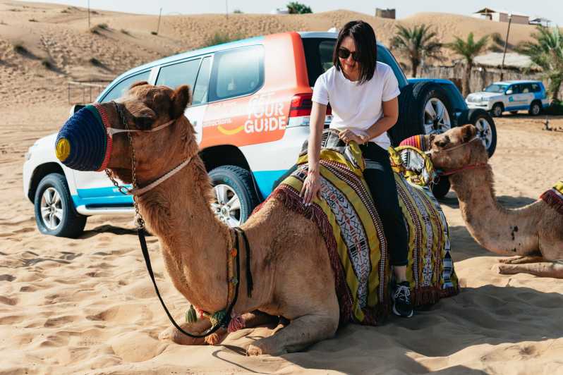 Dubai: Half-Day Desert Safari, Camel Ride & Quad Bike Option | GetYourGuide