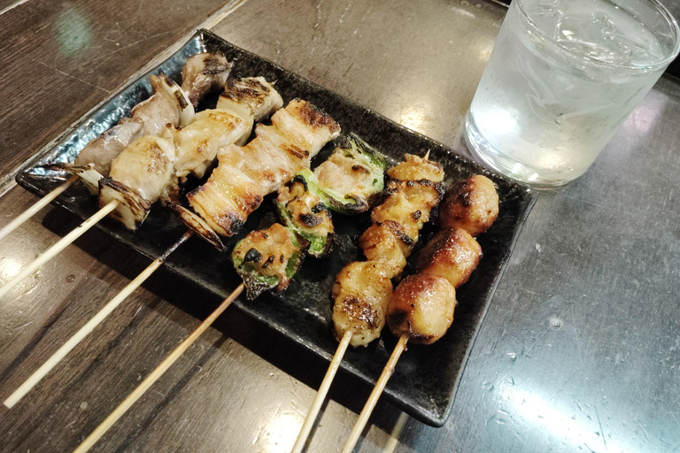 Fukuoka: Nakasu Food Stall Guided Tour with Tastings Group Tour