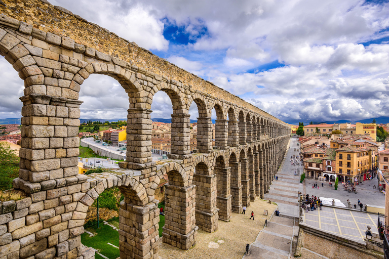 Madrid: Private day tour to El Escorial and Segovia Private day tour El Escorial Monastery & Segovia with van