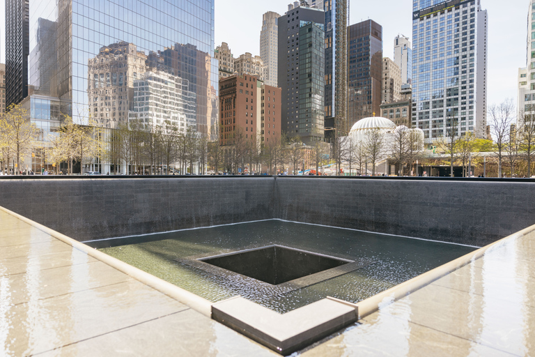 NYC: Wall Street Tour with 9/11 Memorial and Statue Ferry Lower Manhattan Walking Tour