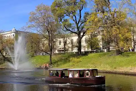 Riga Canal and Daugava Boat Tour with Drink and Audio Guide