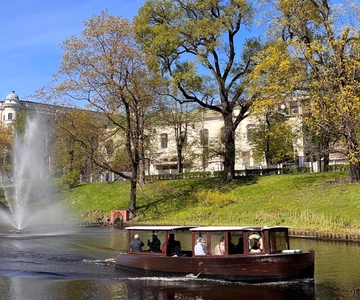 Riga Canal and Daugava Boat Tour with Drink and Audio Guide