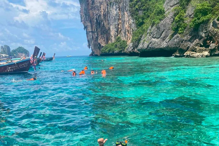 From Phi Phi: Island Hopping & Snorkeling Longtail Boat Tour Half Day Morning Tour