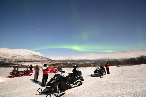 Abisko: Aurora chasing with snowmobilesAurora chasing - Sled