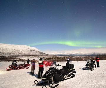 Abisko: Aurora Chasing with Snowmobiles