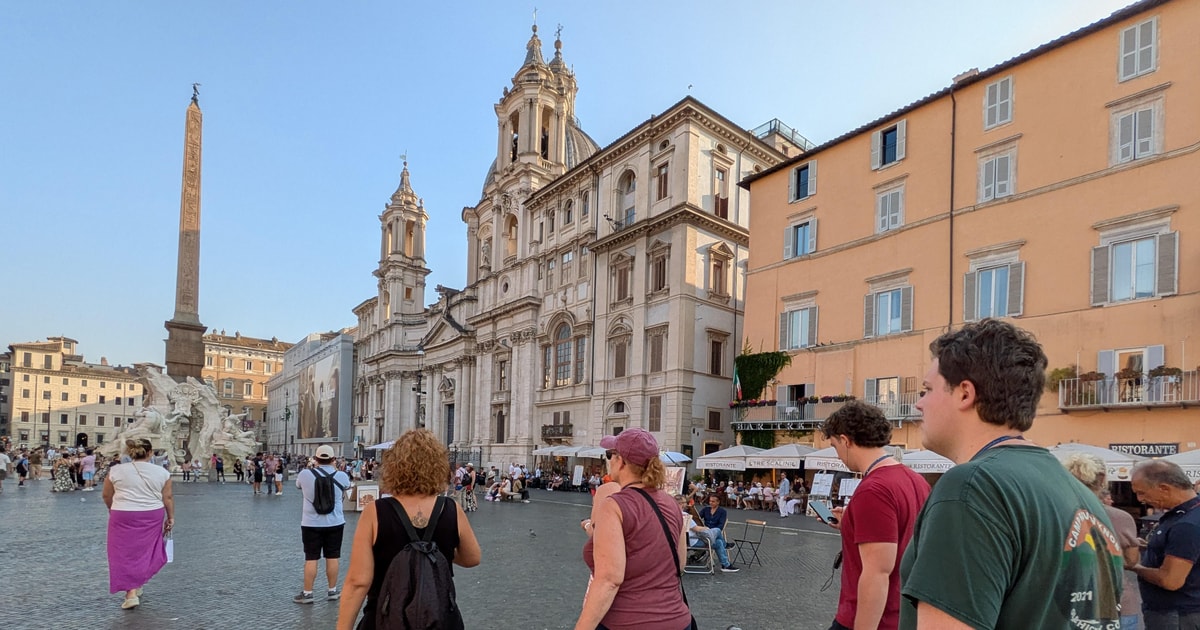 Evening walking group in Piazza Navona on the sunset tour that also stops at Trevi Fountain