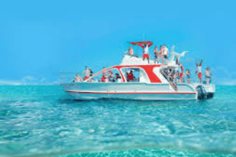 Punta Cana : Bateau de fête + plongée en apnée Musique Boisson Fruit