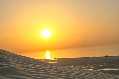 Sunrise or Sunset desert Safari with Sandboarding in Qatar