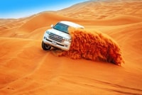 Dubai, Deserto Safari, barbecue, spettacoli, Camel Ride & Sand Boarding - Hizvo