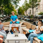 Amsterdam: crociera sui canali in barca scoperta con drink gratuito