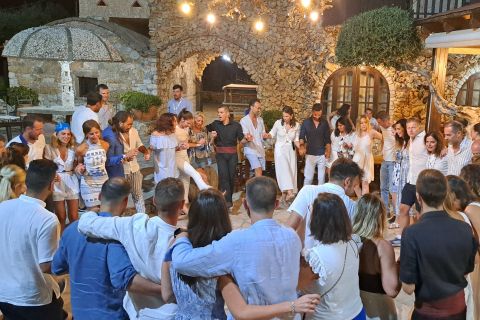 Chania: Cretan Night Dance Show w/ Dinner, Drinks, & Pickup