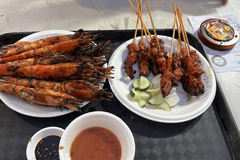 Tour noturno de assinatura: Passeio pela Marina com provas de comidaJunta-te ao grupo