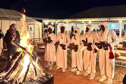 Excursión por el desierto de Merzouga, paseo en camello en quad con tabla de arena y cena