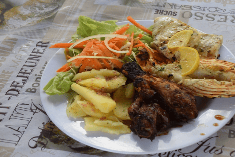 Île aux Bénitiers in motoscafo + nuoto con i delfini e pranzo