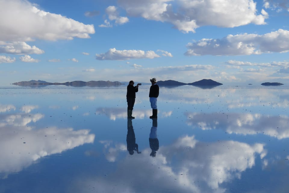 From La Paz Uyuni Salt Flats And Red Lagoon By Bus Getyourguide