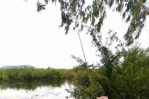 Siem Reap: Fishing in the rice fields, in the villages of Siem Reap