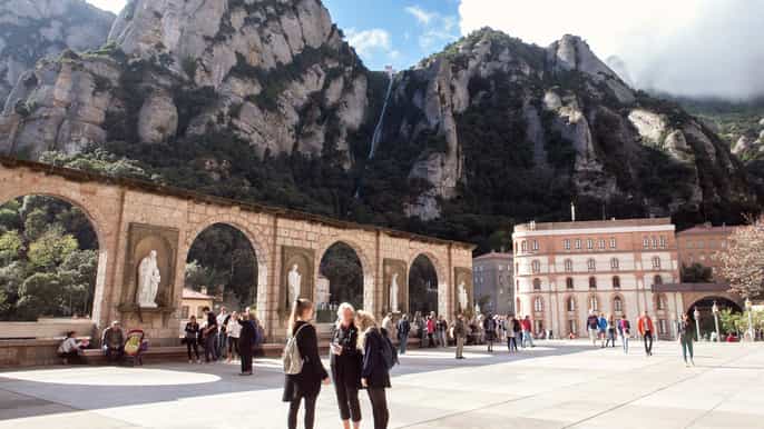 montserrat royal basilica with cogwheel train or bus