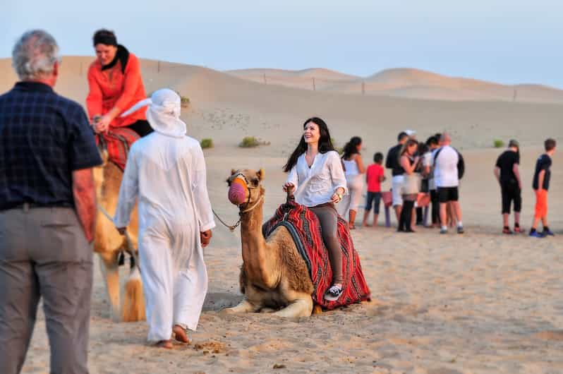 Abu Dhabi Evening Desert Safari And Dinner Under The Stars Getyourguide