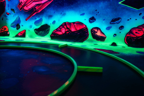 Zurich: Black Light Galaxy Minigolf Monday to Friday Afternoon Time Slots