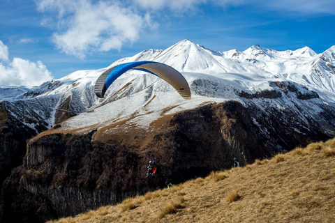 Tbilisi to Gudauri Tour with Rafting Horseback & Paragliding