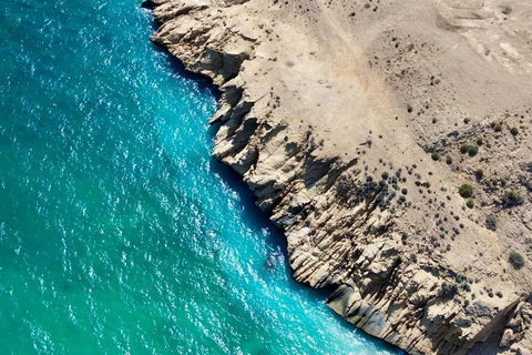 Wadi Shab Hike, Fins Beach Swim & Bimmah Sinkhole Tour