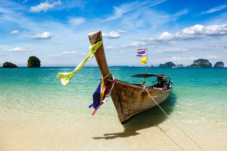 From Phi Phi islands: Phi Phi, Maya Area by longtail Boat Sunset Round