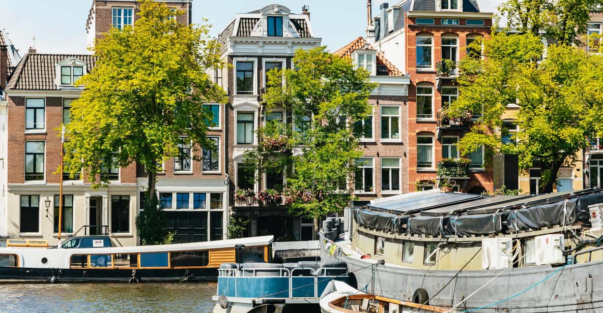 Afbeelding 10 van Amsterdam: Grachtenrondvaart in open boot met drankoptie