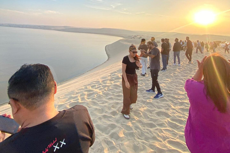 Doha: inland sea Tour With Dune Bashing &Sandboarding fun Doha: safari , camel ride, sandboarding hotel pickup