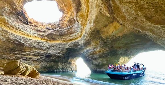 Best Benagil Cave Boat Tours (2026): Ranked, Prices & How to Book Small boat with a marine biologist guide near the Benagil cliffs