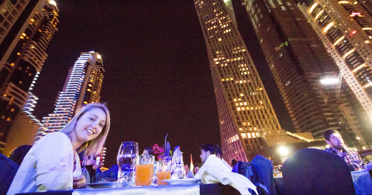 Dhow dinner cruise in dubai marina getyourguide
