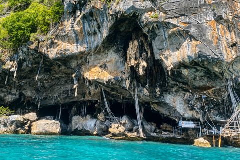 From Phi Phi: Iconic Bays by Longtail—Beach, Lagoon, Snorkel Phi Phi: Longtail Join Trip — Bays, Beach & Snorkeling