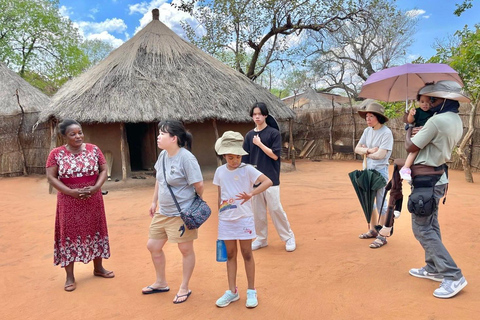 Livingstone: Rhino Walk, Victoria Falls &Mukuni Village Tour