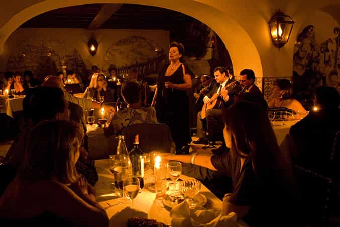 Lisbon: Authentic Fado Show, Dinner and Night Tour | GetYourGuide