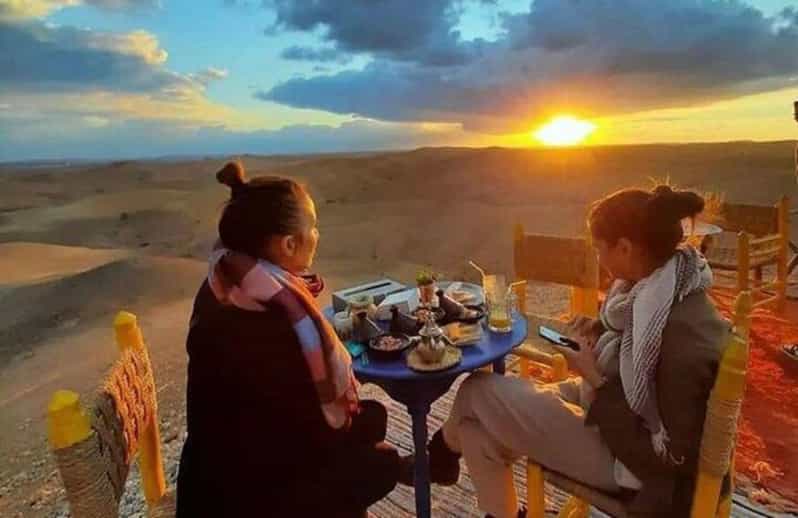 Agafay Desert Camel Ride, Dinner, and Fire Show GetYourGuide