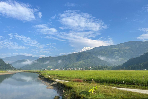 Pokhara: Sunrise, Mountain Biking, and Rafting Tour