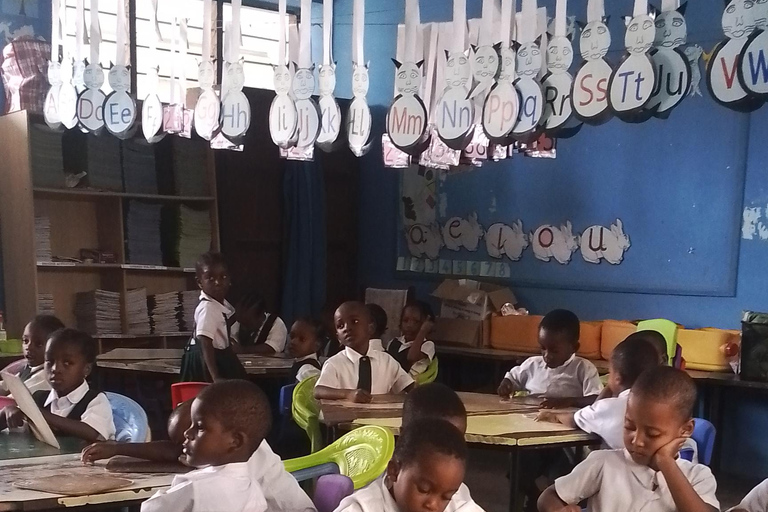 Zanzibar: Stone Town Tour and School Visit with Hassan Discover Town and School Visit with Hassan