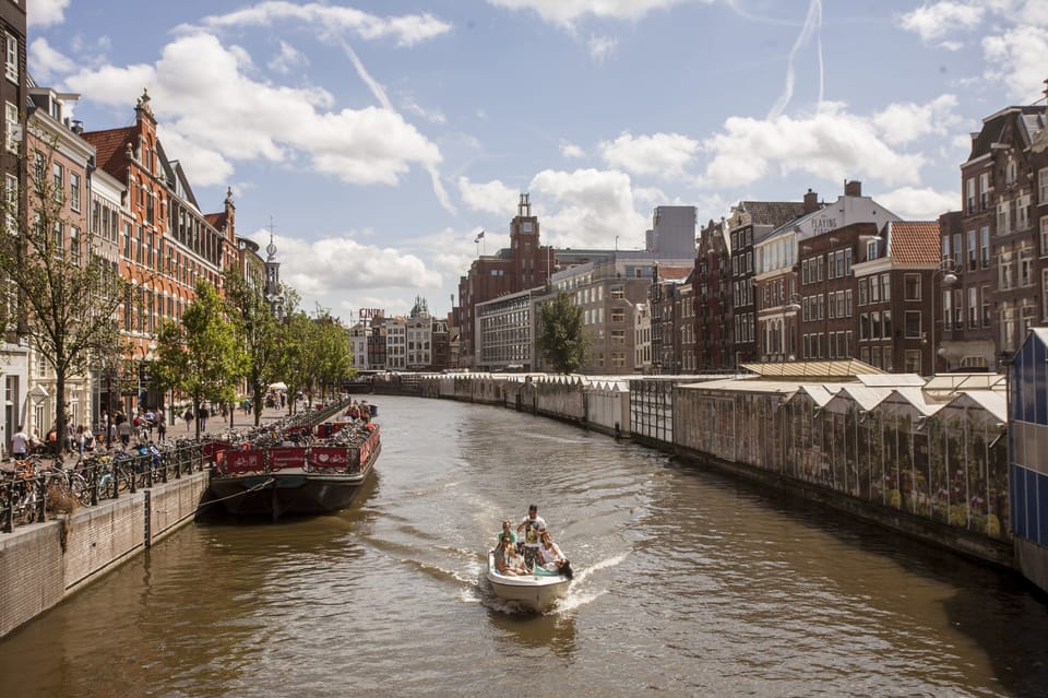 Amsterdam: Hidden Gems & Highlights Guided Bike Tour | GetYourGuide