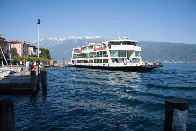 FullDay Lake Garda Tour Bus & Public Boat with Guide GetYourGuide