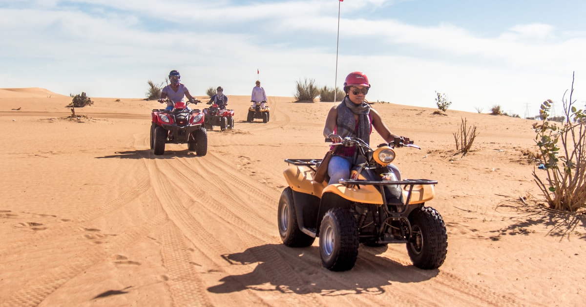 Dubai: Quad Bike Safari with BBQ Dinner & Live Shows | GetYourGuide