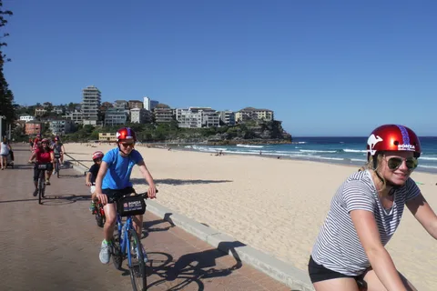 Impresionante paseo en barco y bicicleta por la playa de Manly al atardecer