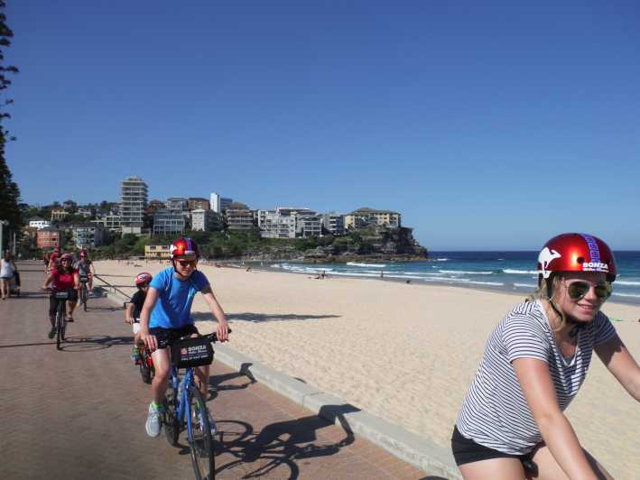Excursie pe bicicletă și croazieră la apus pe plaja Manly Beach, care îți taie respirația