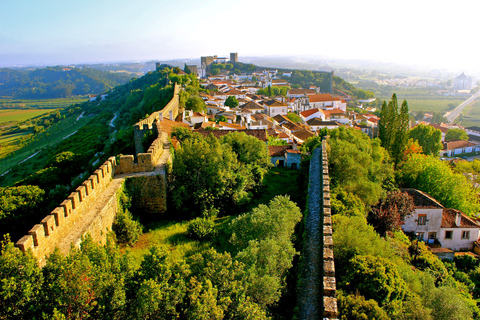 Excursão privada de dia inteiro a Óbidos, Nazaré, Alcobaça e MafraTour privado em inglês, francês, português ou espanhol