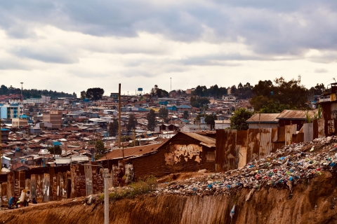 Visit a local Bar, Seeing the overview of the slum, Walking.