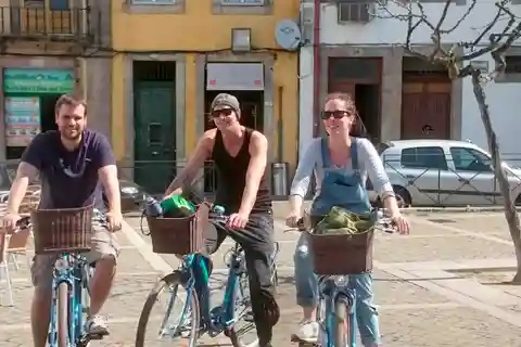 Passeio de bicicleta ao pôr do sol no Porto